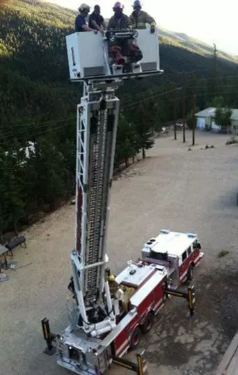 Firefighters in bucket truck
